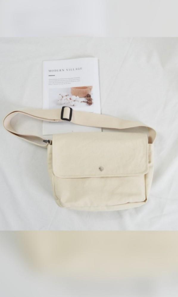 White canvas outlet messenger bag
