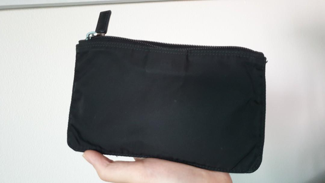 AUTHENTlC PRADA Multifunction Pouch -tessuto nylon (Category: Luxury Bags & Wallets) located in San Juan City. Submitted by akioza (Listing ID 1081905703, Image 3). Description: Directly store bought in Prada boutique. Classic Vela Nylon flat but flexible pouch Feel free to check greenbelt. Selling discounted plus prices go up in time. THIS is in the classic range. Handy, to attach keychains & accessories on it / bag tags Black. Classic. Won't go