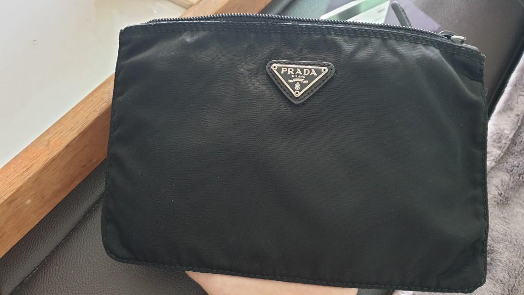 AUTHENTlC PRADA Multifunction Pouch -tessuto nylon (Category: Luxury Bags & Wallets) located in San Juan City. Submitted by akioza (Listing ID 1081905703, Image 2). Description: Directly store bought in Prada boutique. Classic Vela Nylon flat but flexible pouch Feel free to check greenbelt. Selling discounted plus prices go up in time. THIS is in the classic range. Handy, to attach keychains & accessories on it / bag tags Black. Classic. Won't go