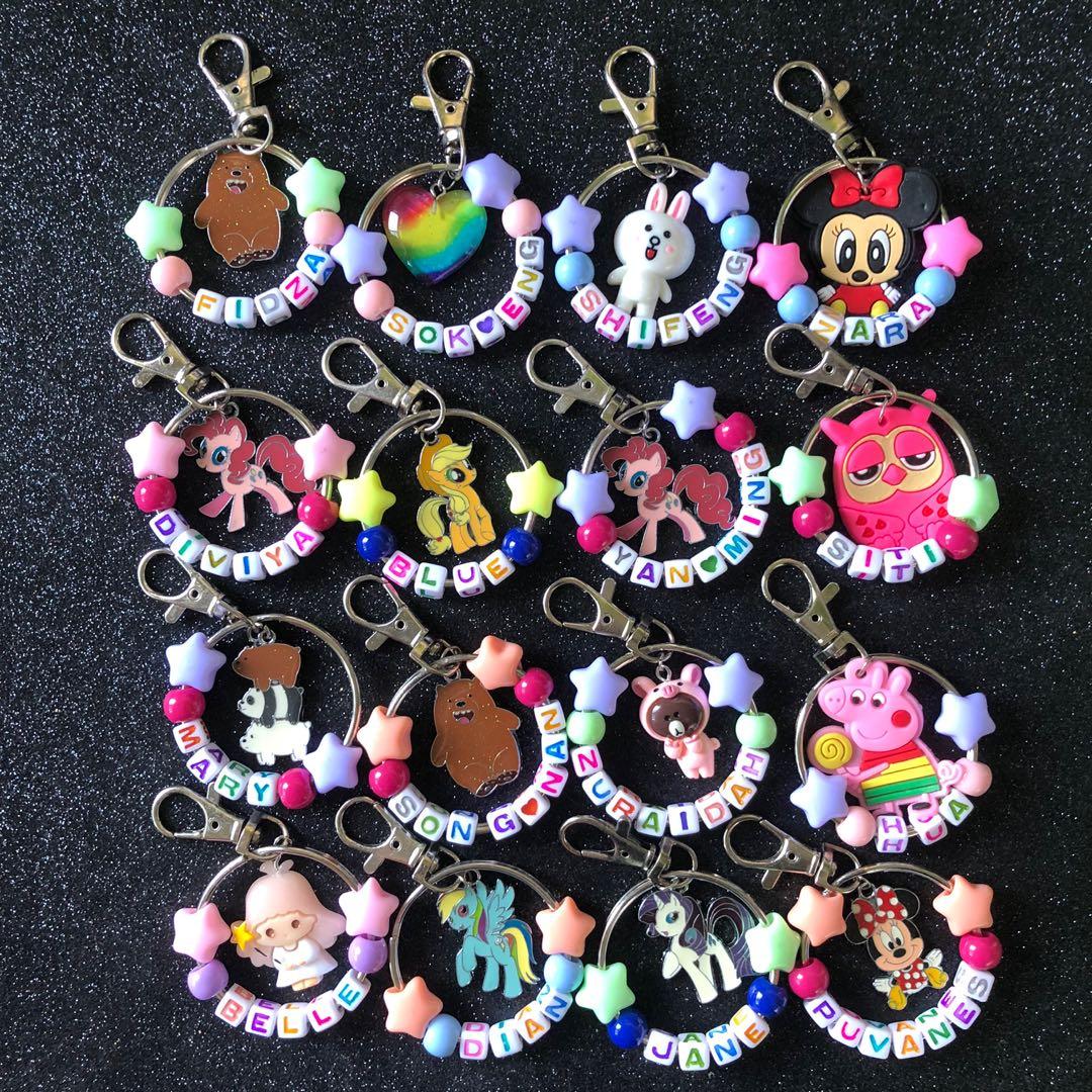 Customized keychains (Category: Craft Supplies & Tools) located in Singapore. Submitted by maylingcraft (Listing ID 1081901492, Image 1). Description: Pricing With normal charm $2.50 With premium charm $3.00 Kindly advice the following when placing your order 1. Star bead color choice 2. Round bead color choice 3. Name 4. Charm choice 5 Packaging choice Note : - random color will be given for alphabet beads - Maximum alphabet including spacing is