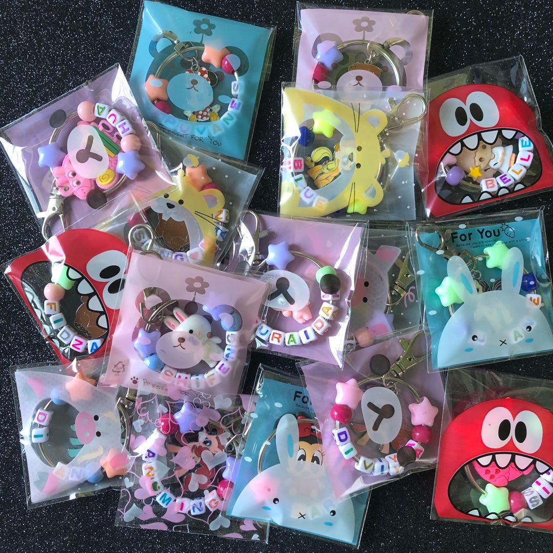 Customized keychains (Category: Craft Supplies & Tools) located in Singapore. Submitted by maylingcraft (Listing ID 1081901492, Image 2). Description: Pricing With normal charm $2.50 With premium charm $3.00 Kindly advice the following when placing your order 1. Star bead color choice 2. Round bead color choice 3. Name 4. Charm choice 5 Packaging choice Note : - random color will be given for alphabet beads - Maximum alphabet including spacing is