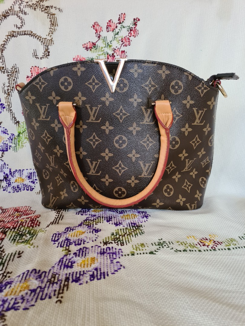 Louis Vuitton LV hand carry, Women's Fashion, Bags & Wallets, Purses &  Pouches on Carousell