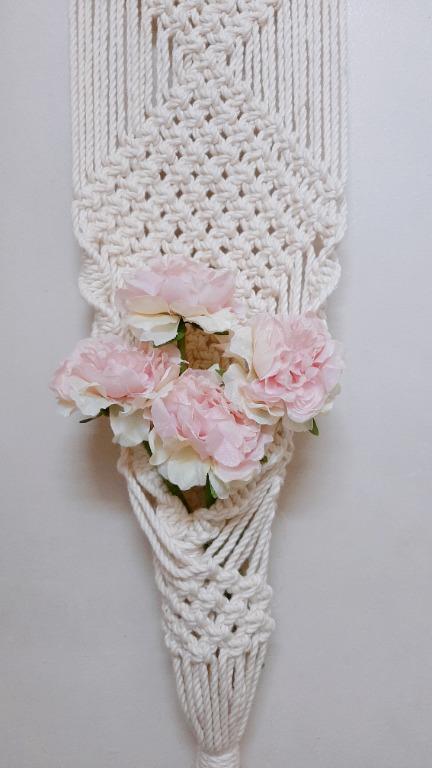 Macrame Plant, Artificial/Preserved Flower Succulents Wall Hanging (Category: Wall Decor) located in Manila. Submitted by chiero_sells (Listing ID 1081821886, Image 2). Description: unique way to display your plants, artificial/preserved flowers and succulents? color/size used: cream/5mm product length: 9 inches × 27 inches *artificial flower shown in the pic isn't included* you can customize it if u want cream/4mm or ash white/3mm pm for more de