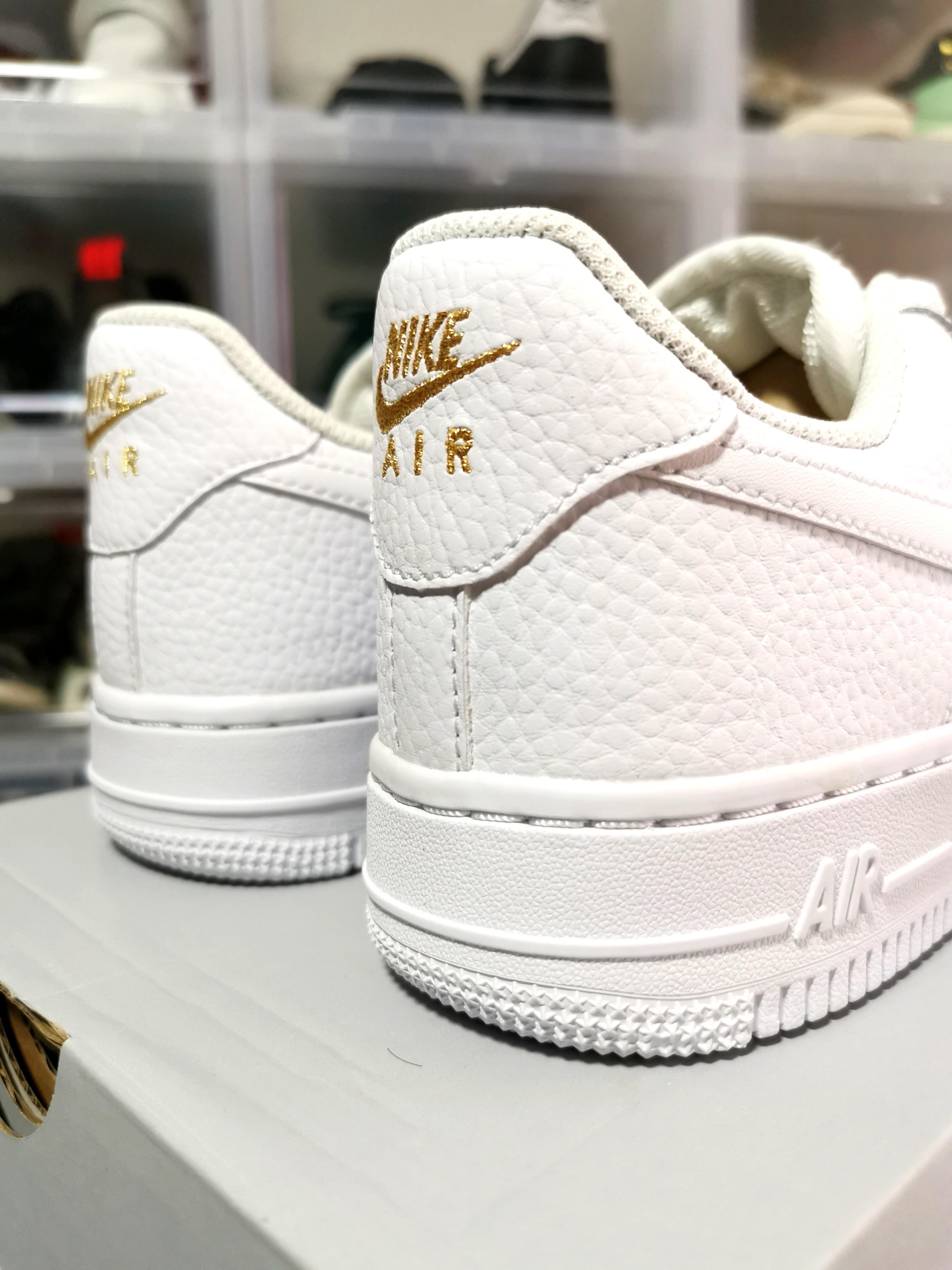 Nike Womens Air Force 1 07 ESS White Mini Gold Swoosh Women s