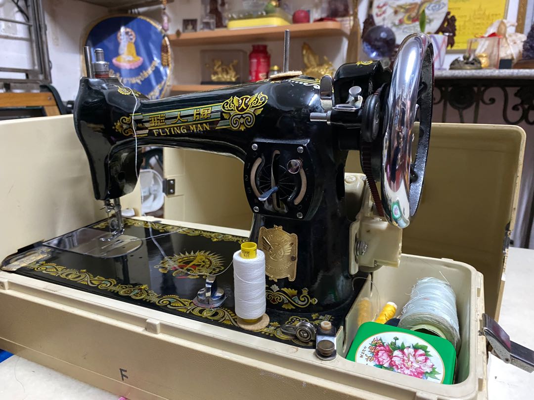 Vintage Flying Man Sewing Machine, Hobbies & Toys, Memorabilia