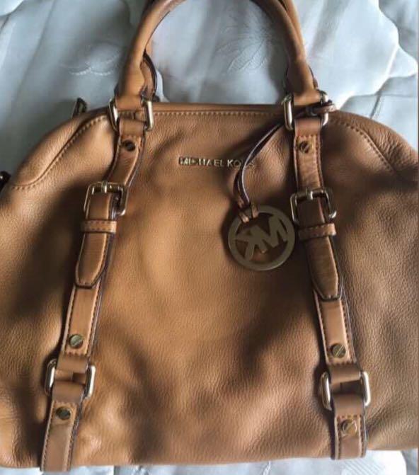 Authentic Michael Kors Bedford bag (Category: Luxury Bags & Wallets) located in Quezon City. Submitted by mkmsells (Listing ID 1082093449, Image 3). Description: Authentic MK Bedford bag bought from Rustan’s for 22k. Selling low for Php 7,000 SF c/o buyer. .