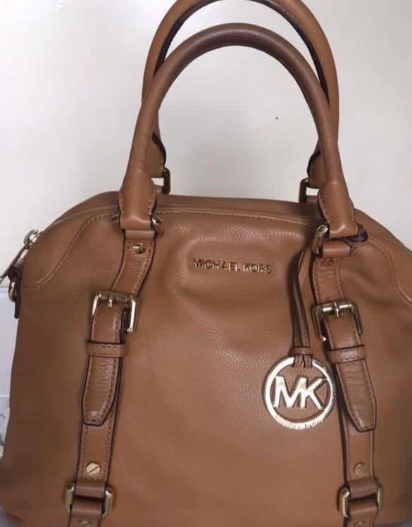 Authentic Michael Kors Bedford bag (Category: Luxury Bags & Wallets) located in Quezon City. Submitted by mkmsells (Listing ID 1082093449, Image 2). Description: Authentic MK Bedford bag bought from Rustan’s for 22k. Selling low for Php 7,000 SF c/o buyer. .
