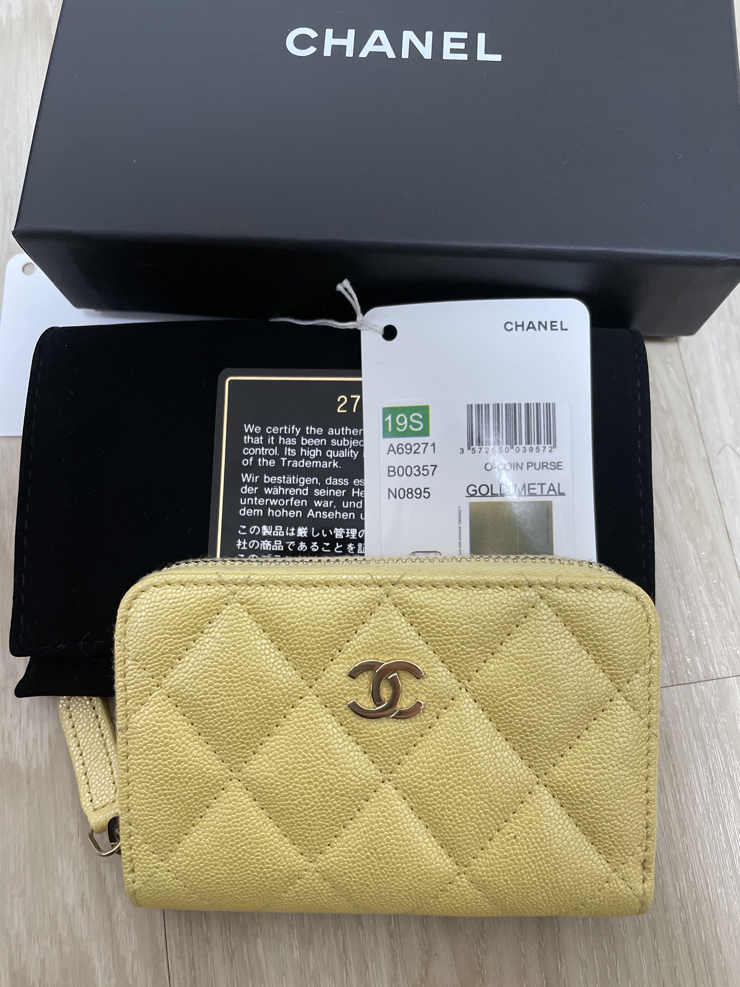 Chanel iridescent yellow zipped coin purse, Luxury, Bags & Wallets