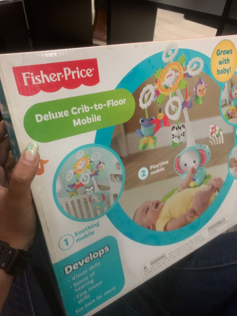 Fisher price deluxe crib to 2025 floor mobile