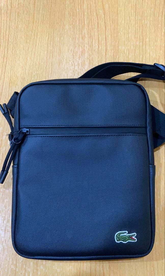 Lacoste sling sales bag size