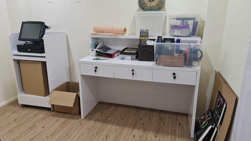 Practical study table (Category: Tables & Sets) located in Singapore. Submitted by patail (Listing ID 1082110280, Image 1). Description: A customised study / work desk with ample hidden storage spaces. Nice top ledge for display of ornaments /accolades. Condition is good . Only about 3 yrs old. Ht of the rear .=1.3m. Length of table =1.6m From table top to floor= 1m. Width: 0.4-0.5m It was custom made well for work or study . .