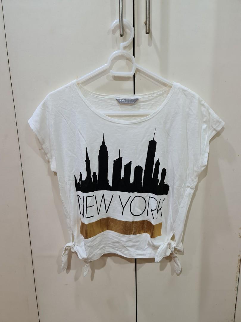 White semi crop top blouse (Category: Shirts) located in Muntinlupa City. Submitted by bmaxee (Listing ID 1082158751, Image 1). Description: .