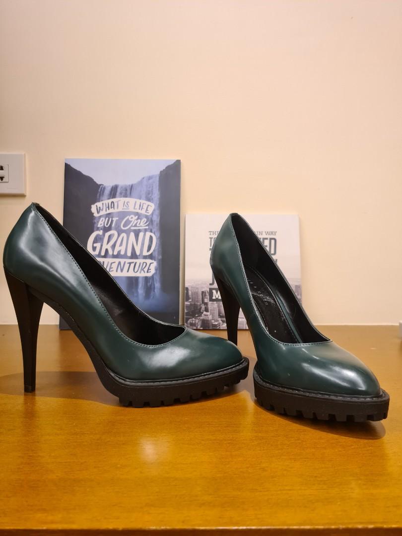 Charles & Keith (Category: Heels) located in Pasig City. Submitted by yourgotobag (Listing ID 1082314403, Image 1). Description: only been used once with dust bag size 7 1/2 - 8. sturdy army green leather.