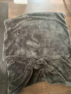 Grey furry throw blanket