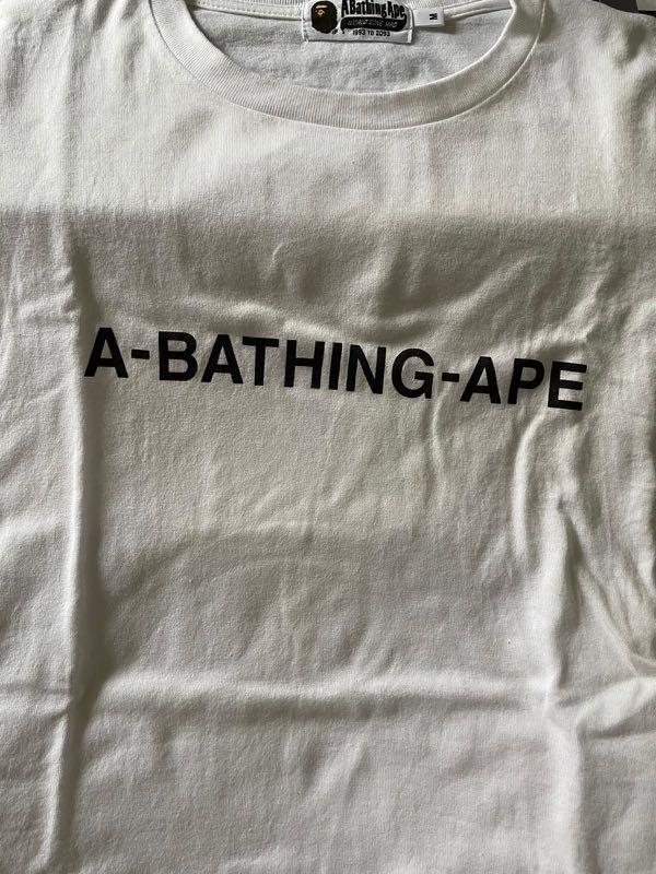 Bape Script Tee (Category: Tshirts & Polo Shirts) located in Singapore. Submitted by user2310 (Listing ID 1082491246, Image 1). Description: Worn 2-3x max and folded in cupboard since. Rarely worn Size M fits L (boxy relaxed tee) WTS only Not looking for trades .