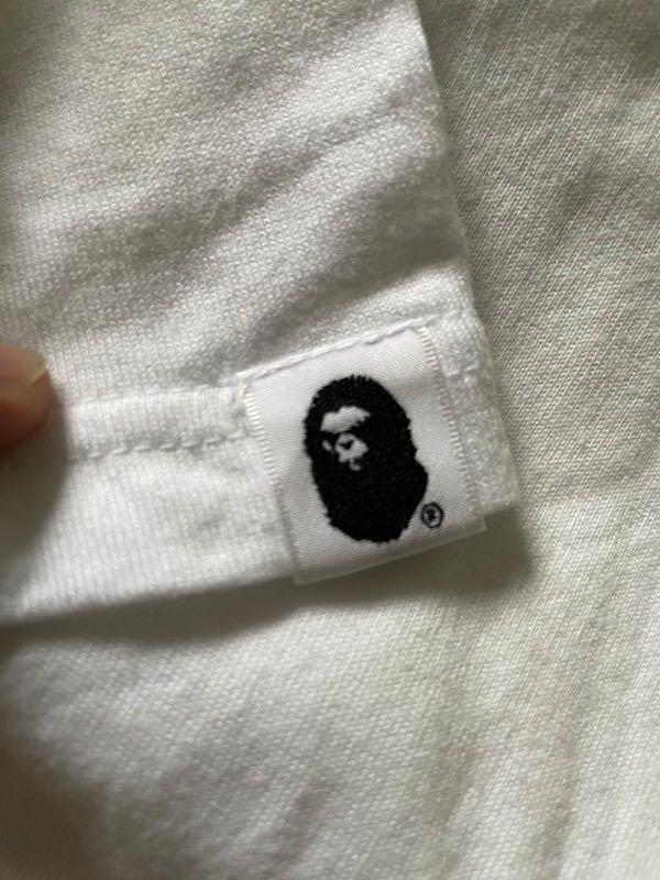 Bape Script Tee (Category: Tshirts & Polo Shirts) located in Singapore. Submitted by user2310 (Listing ID 1082491246, Image 3). Description: Worn 2-3x max and folded in cupboard since. Rarely worn Size M fits L (boxy relaxed tee) WTS only Not looking for trades .