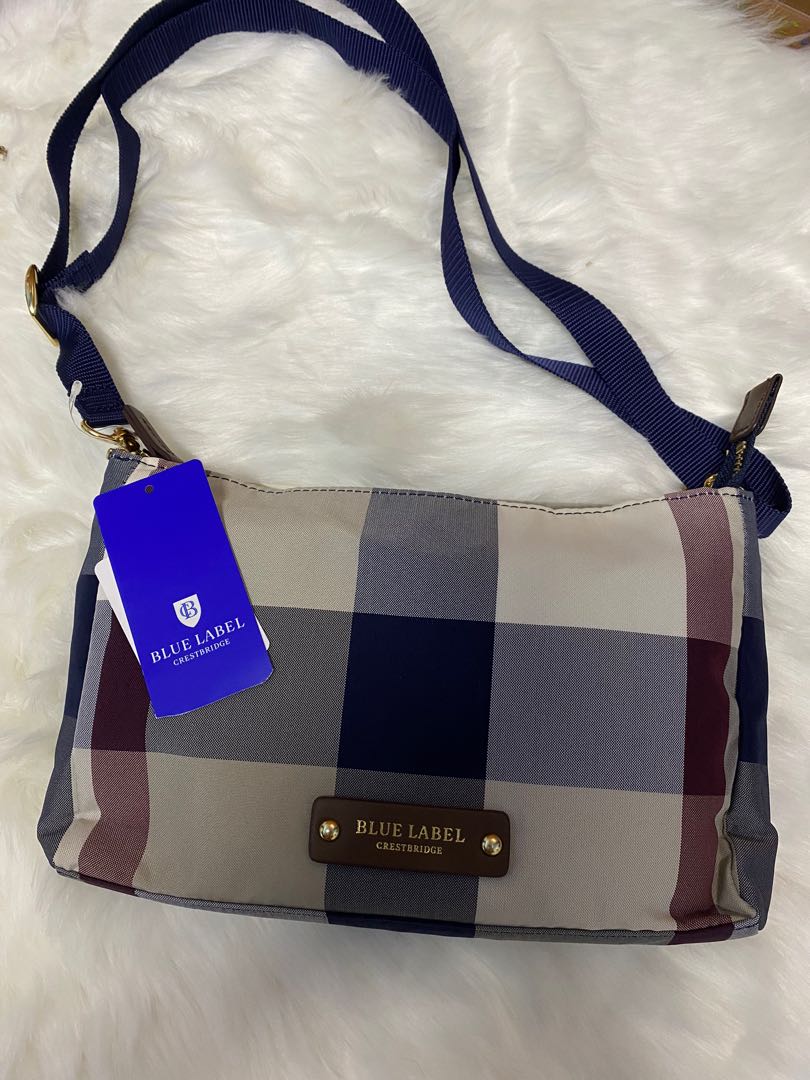 Blue label sling bag on sale