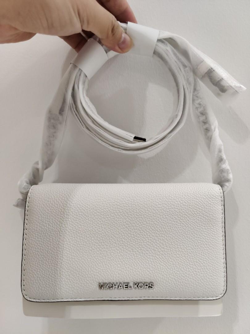 BNIB Michael Kors Jet Set Travel Medium Phone Crossbody Optic White,  Women's Fashion, Bags & Wallets, Cross-body Bags on Carousell