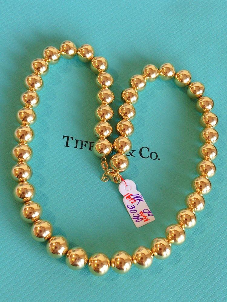 Tiffany ball and chain top