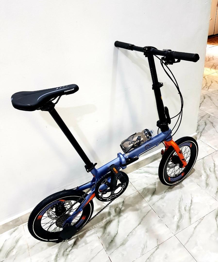 Forward folding outlet bike