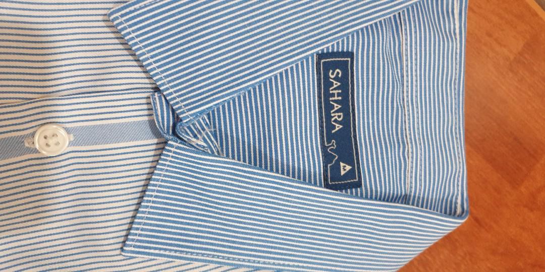 SAHARA blue stripes polo (Category: Formal Shirts) located in Manila. Submitted by cheezykz (Listing ID 1078975815, Image 2). Description: SAHARA blue stripes polo euc size medium.