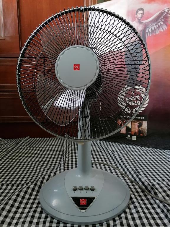 https://media.karousell.com/media/photos/products/2021/4/21/kdk_table_fan_1619007050_284bf909_progressive