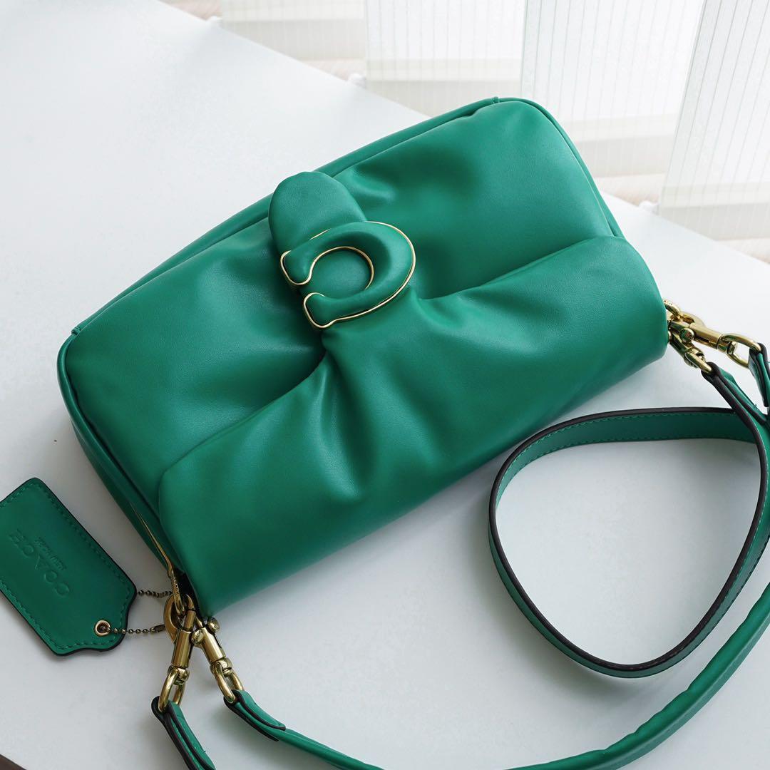 coach cream pillow bag