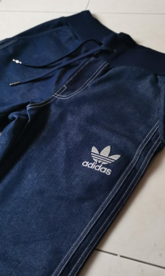 Adidas originals cuffed on sale denim blue jeans