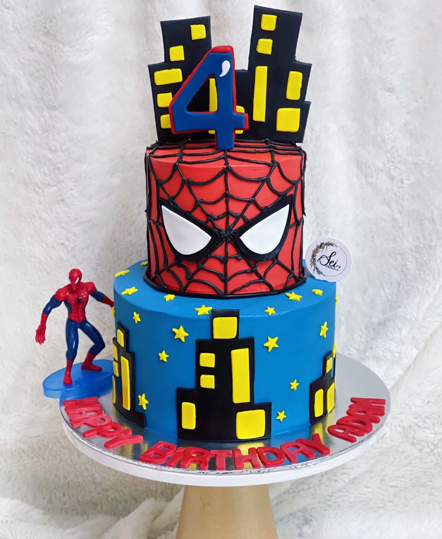 Avengers themed 2 tier cake with batman, spiderman, iron man and deadpool | Tiered  cakes, Graduation cakes, Cake designs