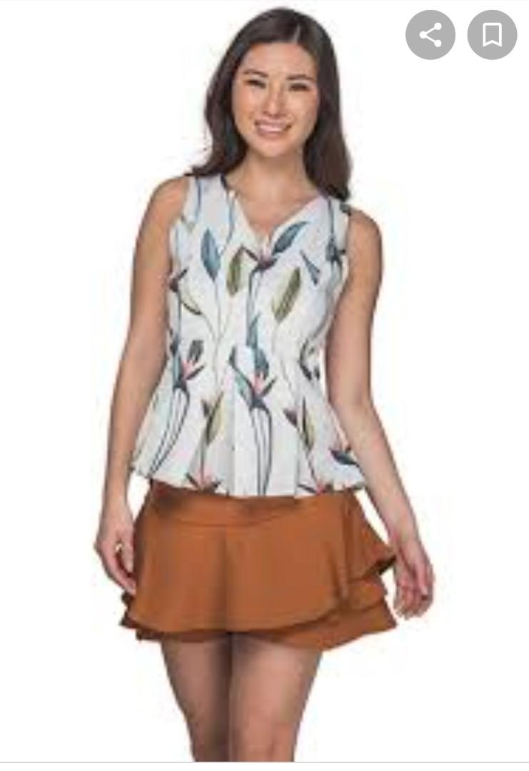 Plains and Prints Flowery Top (Category: Sleeveless) located in Quezon City. Submitted by professional.declutterer (Listing ID 1083423573, Image 1). Description: Plains and Prints Flowery Top Used 3x only Very nice in actual MOP: BDO/BPI/Gcash/Paymaya Location: Roosevelt QC RFS: decluterring and for baby's vaccines.