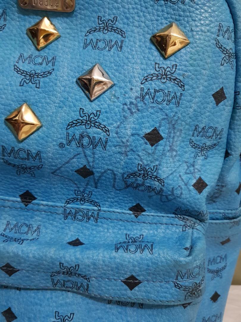 Pre-owned Authentic Mcm Backpack (Category: Luxury Bags & Wallets) located in Antipolo. Submitted by dlolin (Listing ID 1083336724, Image 2). Description: Guaranteed authentic. Bought in Korea. Signs of used and that cute little artwork or autograph you see.