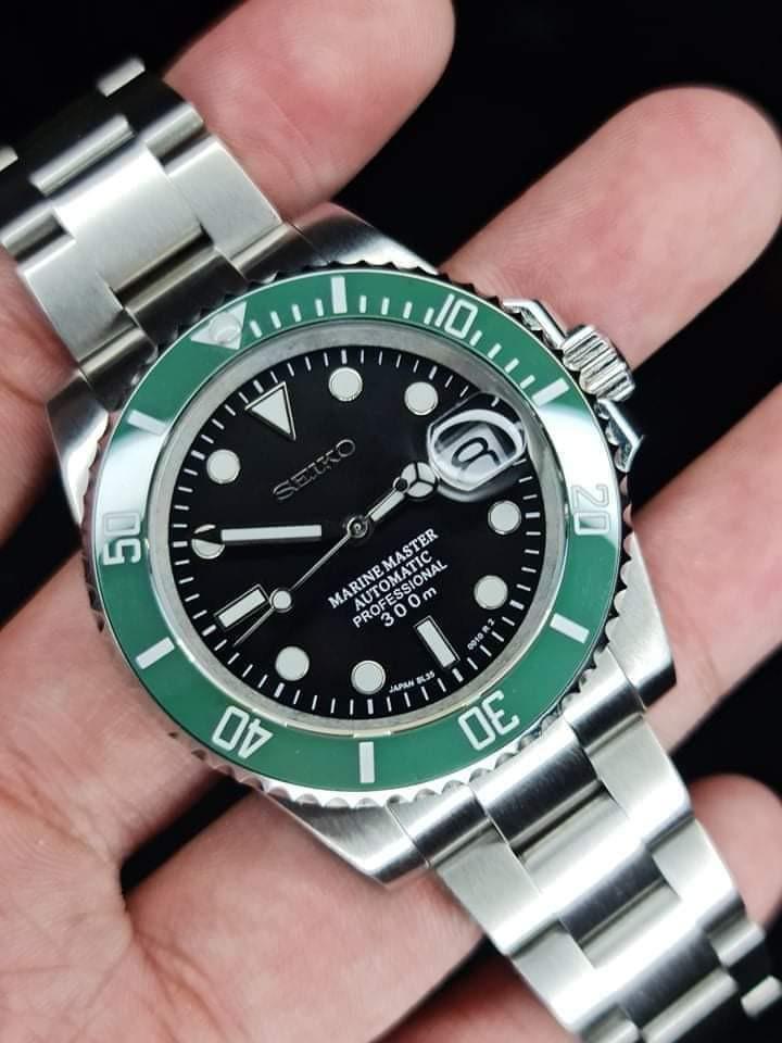 Seiko/Rolex Homage Mod 40mm (Category: Luxury Watches) located in Manila. Submitted by markwrist07 (Listing ID 1083267770, Image 3). Description: Seikolex Homage Mods 40mm restocked and repriced at PHP14,999! PM us for orders! 🙏 New and Improved 904L stainless steel Seikolex Homage Mod 40mm • SUBMARINER • YACHTMASTER • GMT Specifications: - 904L stainless steel Sub Case 40mm - Sapphire Crystal with date cyclops - 904L Solid Links and Endlinks Oy