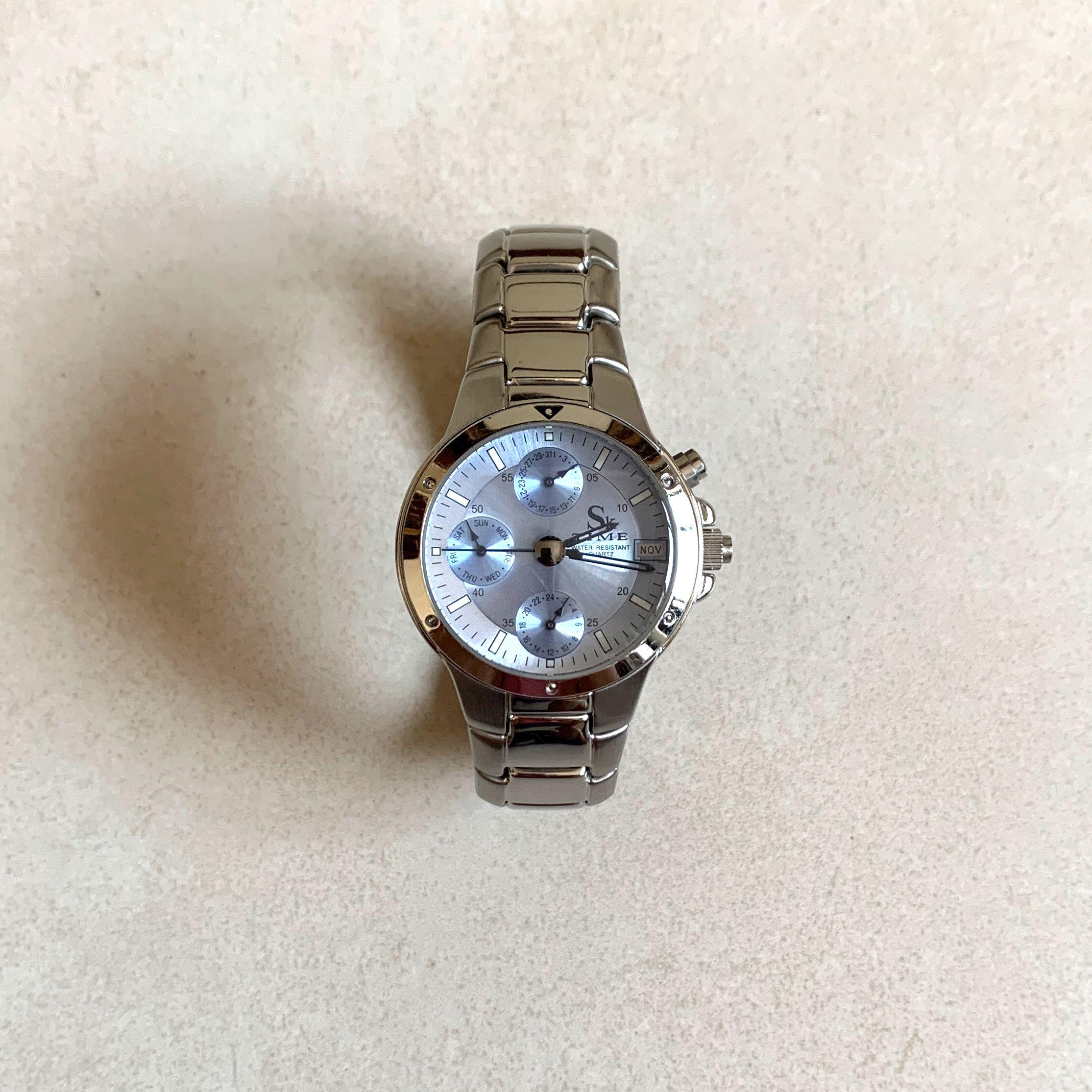 Sk time watch price clearance
