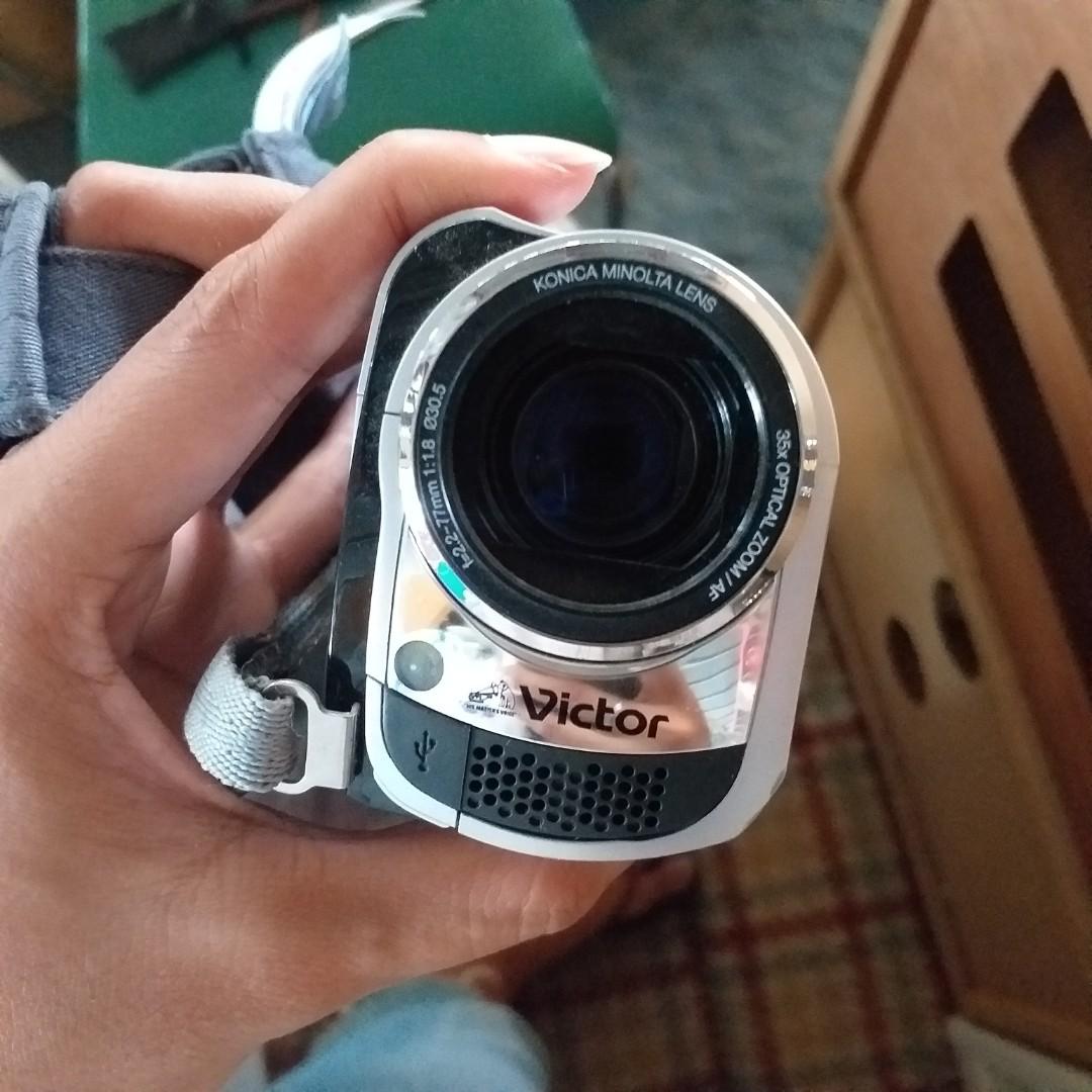 Victor Video/Digital Camera Like New Condition Untested y2k Handheld/Handicam Camera (Category: Video Cameras) located in Cavite. Submitted by kayepastelero (Listing ID 1083293348, Image 2). Description: Victor Handicam/Handheld Camera y2k •Untested •No box, no charger, no batteries •Minolta Lens •Like New Condition (looks like it just came right out off the box, no sign of usage) DM FOR INQUIRIES.