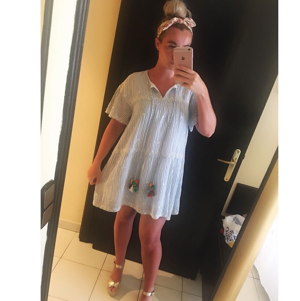 Striped dress with hot sale pom poms zara