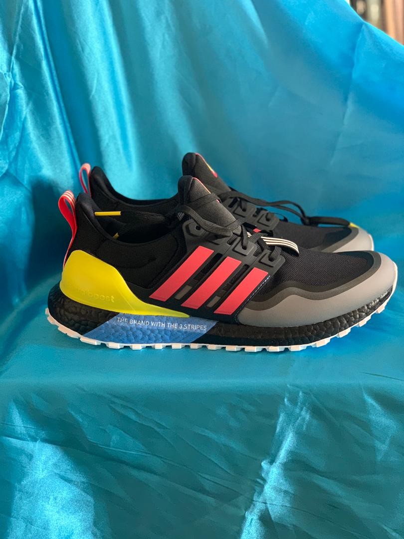 Adidas ultra boost all terrain shock red hotsell yellow