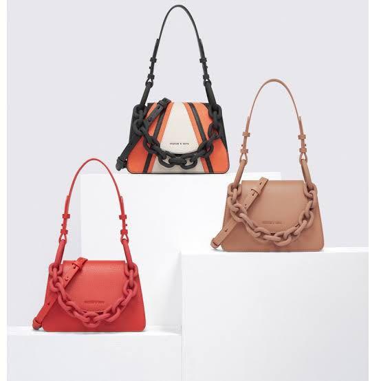 CHARLES & KEITH - Featuring a chunky chain link strap