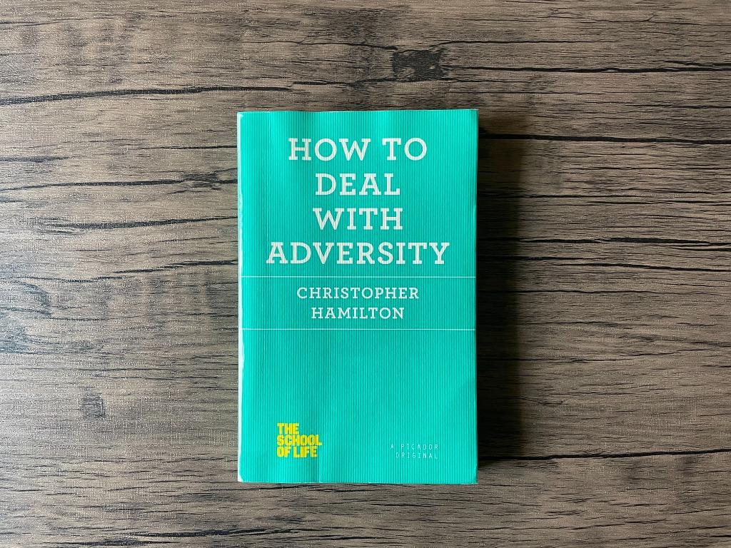 How to Deal with Adversity by Christopher Hamilton (Self-Help) (Category: Storybooks) located in Santa Rosa. Submitted by drawerfinds (Listing ID 1083515769, Image 1). Description: Note: book covered with plastic 'No matter how insulated we are by wealth or friends, we can all expect to undergo some form of loss, failure, or disappointment. The common reaction is to bear it as best we can―some do this better than others―and move on with life. Dr.