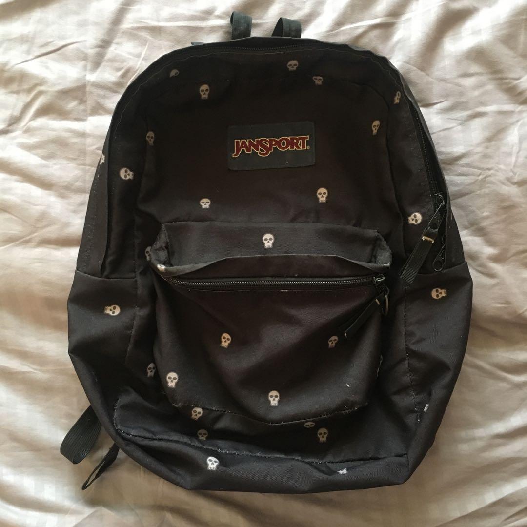 JANSPORT Black backpack with skull pattern Men s Fashion Bags