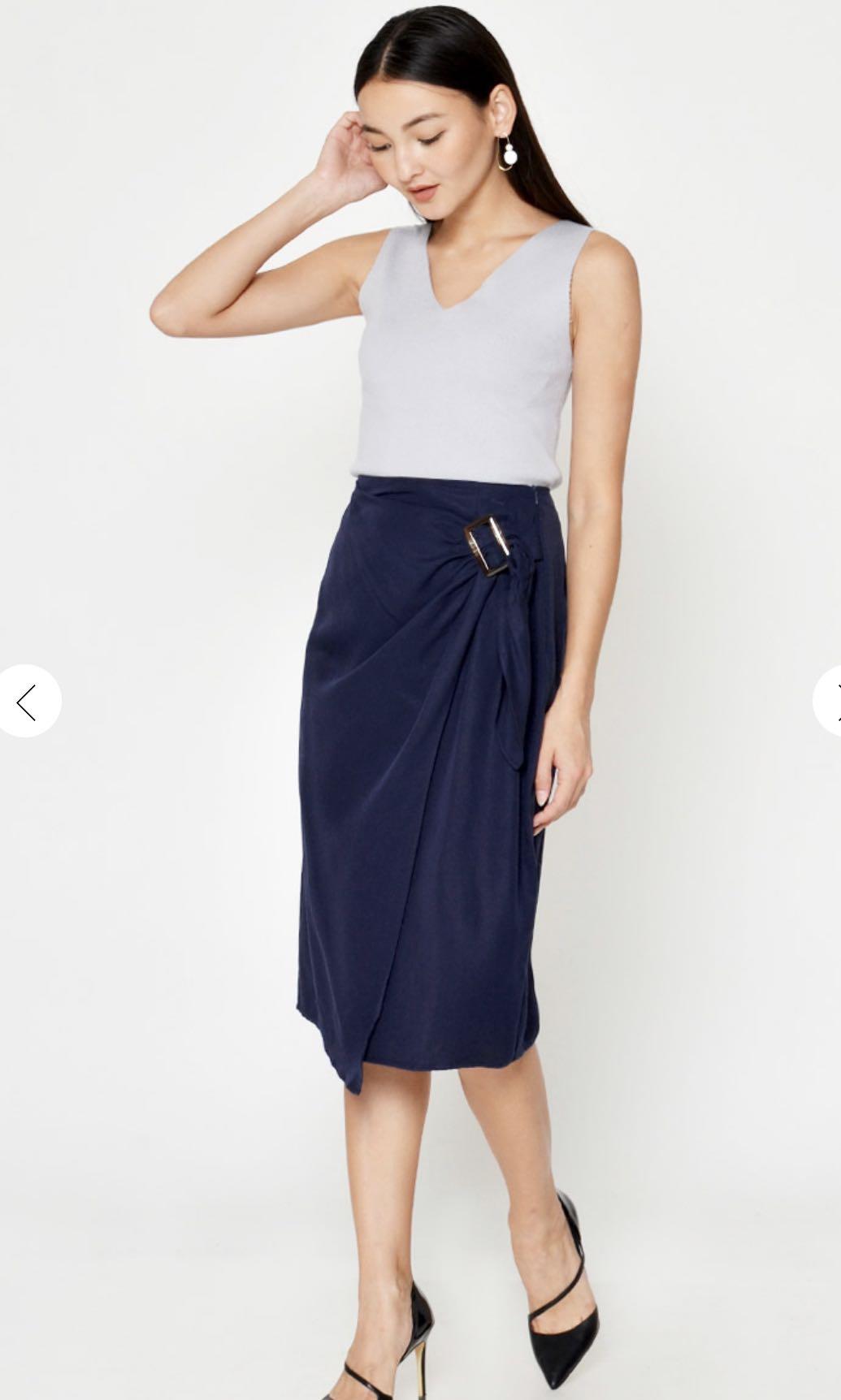 Love & Bravery DREZEL TENCEL BUCKLE DRAPE MIDI SKIRT NAVY XS (Category: Sleeveless) located in Singapore. Submitted by lynly_ (Listing ID 1083559424, Image 1). Description: .