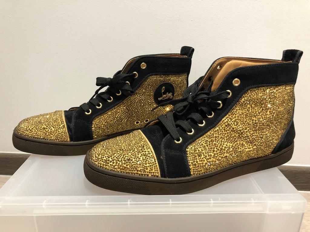 Christian louboutin black best sale and gold sneakers
