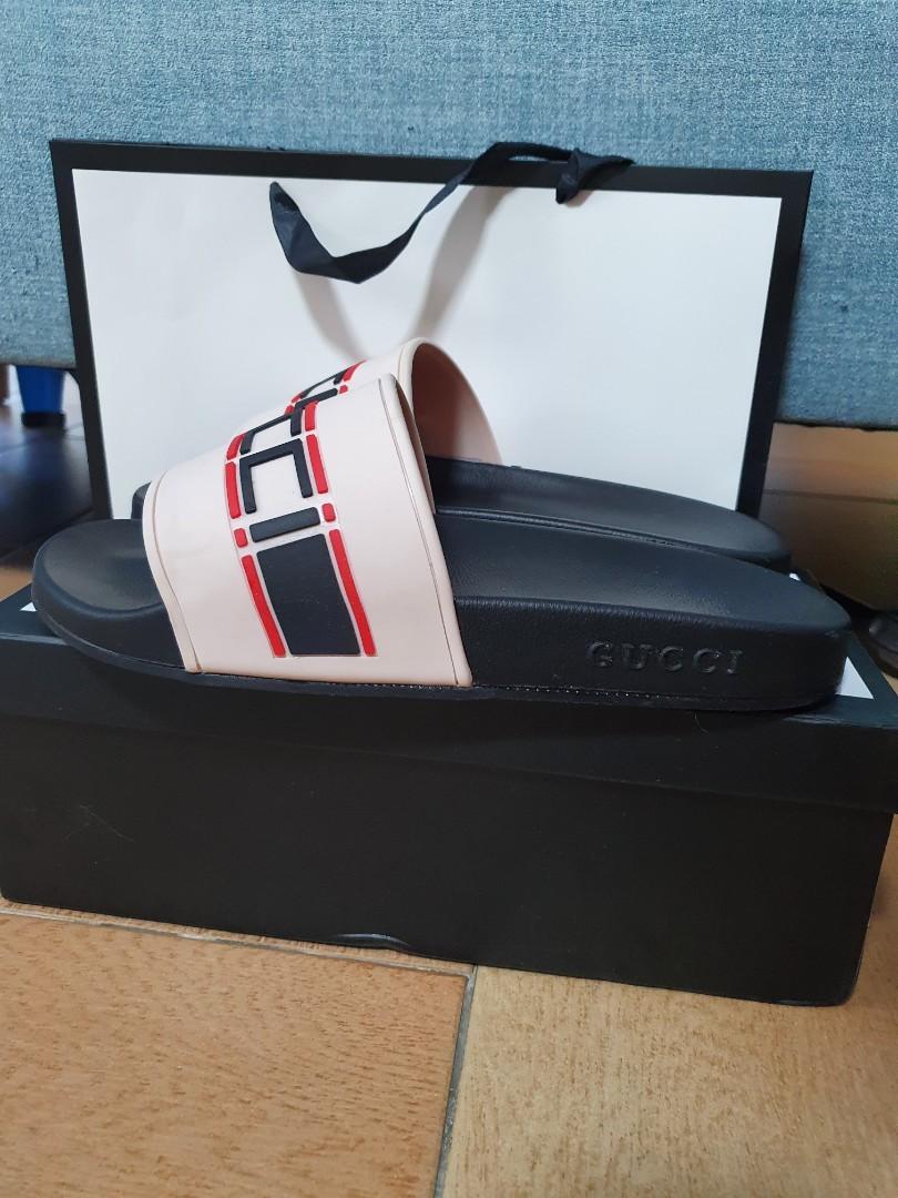 Gucci pursuit striped rubber sliders outlet