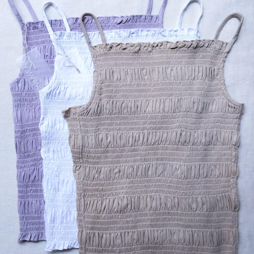 H&M Smocked Halter Top (Category: Sleeveless) located in Marikina City. Submitted by happycache (Listing ID 1083804283, Image 1). Description: BNWT ♡ Available in Lilac S (1) Small | 12" width 18" length Model is wearing size small Dm if interested ♡ © H&M.