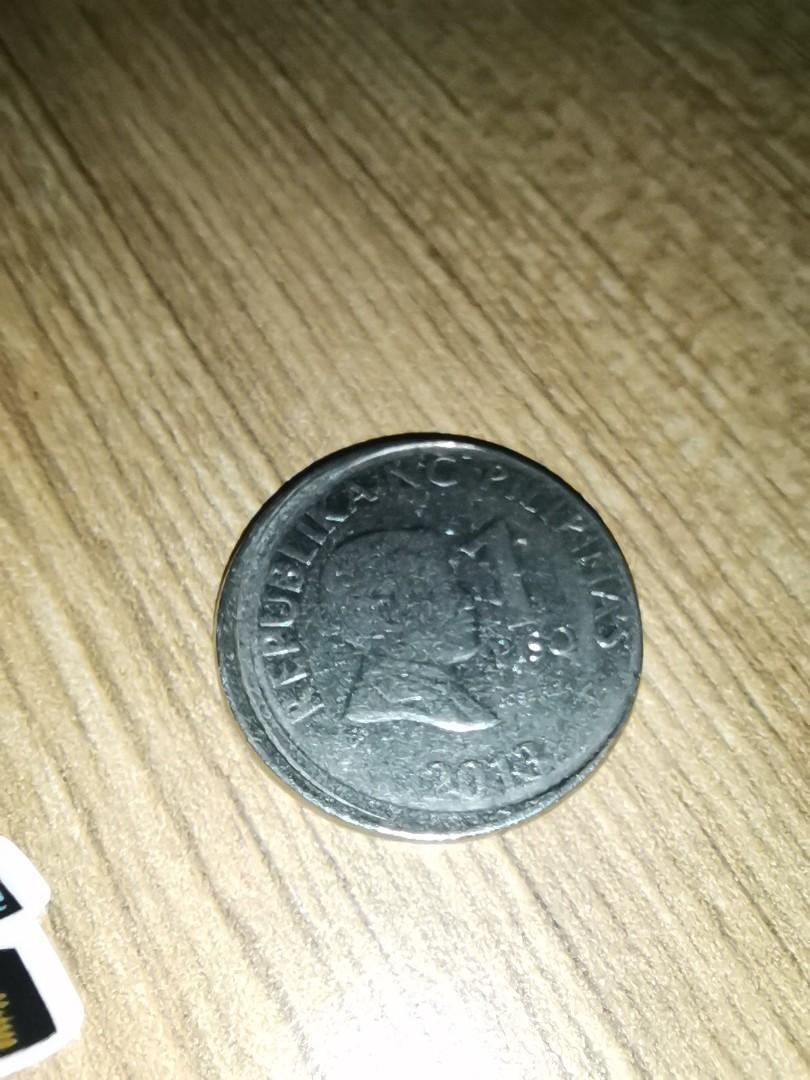 1 peso error off center 2013 coin (Category: Currency) located in San Pedro. Submitted by btger (Listing ID 1084005210, Image 1). Description: Rare 2013 1 peso error coin, off-center. Bid your price.