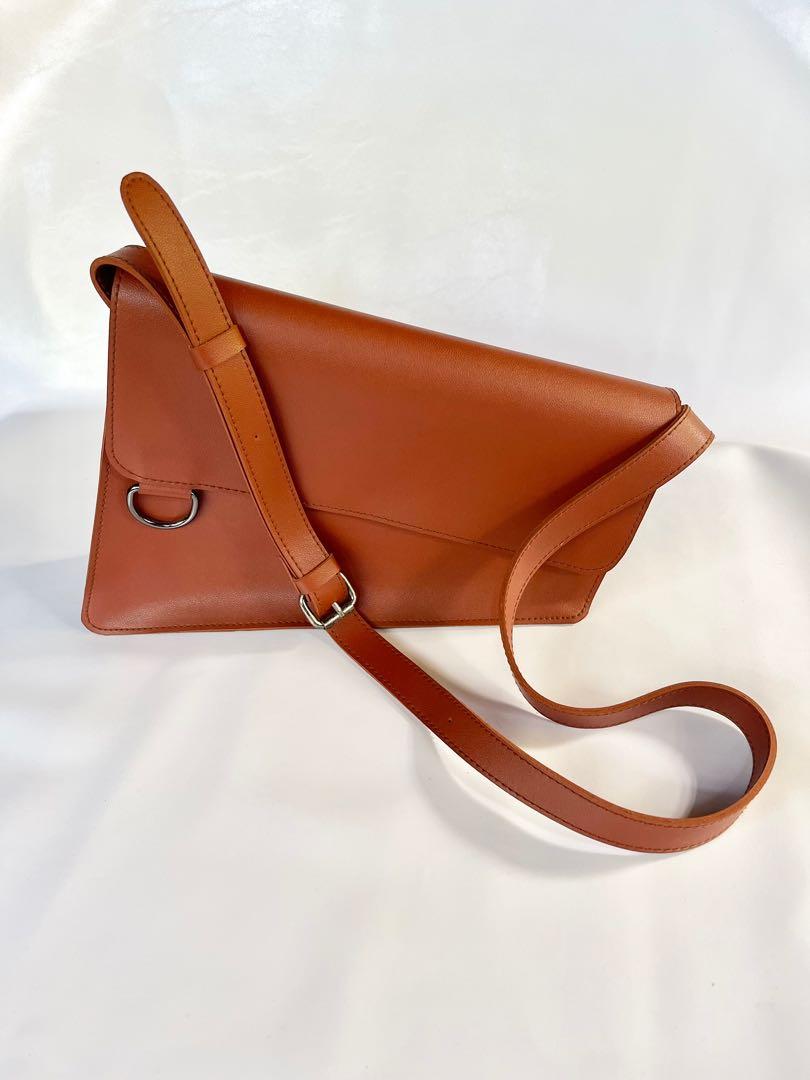 Afternoonfridays A5 Asymmetrical Swing Bag in Rust (Category: Cross-body Bags) located in Dumaguete. Submitted by eucccuy (Listing ID 1083935357, Image 2). Description: Hi There! Selling my Afternoonfridays A*5 Asymmetrical Bag. This is a UNISEX Bag btw. Afternoonfridays is a Local Brand btw. This bag is so chic and minimalist, & you can literally pair it with anything. I just need to let go of it since I am not able to use it with the volume of 
