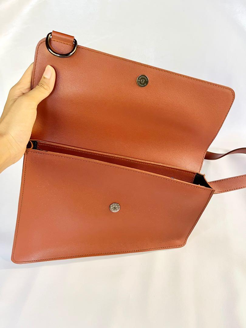 Afternoonfridays A5 Asymmetrical Swing Bag in Rust (Category: Cross-body Bags) located in Dumaguete. Submitted by eucccuy (Listing ID 1083935357, Image 3). Description: Hi There! Selling my Afternoonfridays A*5 Asymmetrical Bag. This is a UNISEX Bag btw. Afternoonfridays is a Local Brand btw. This bag is so chic and minimalist, & you can literally pair it with anything. I just need to let go of it since I am not able to use it with the volume of 