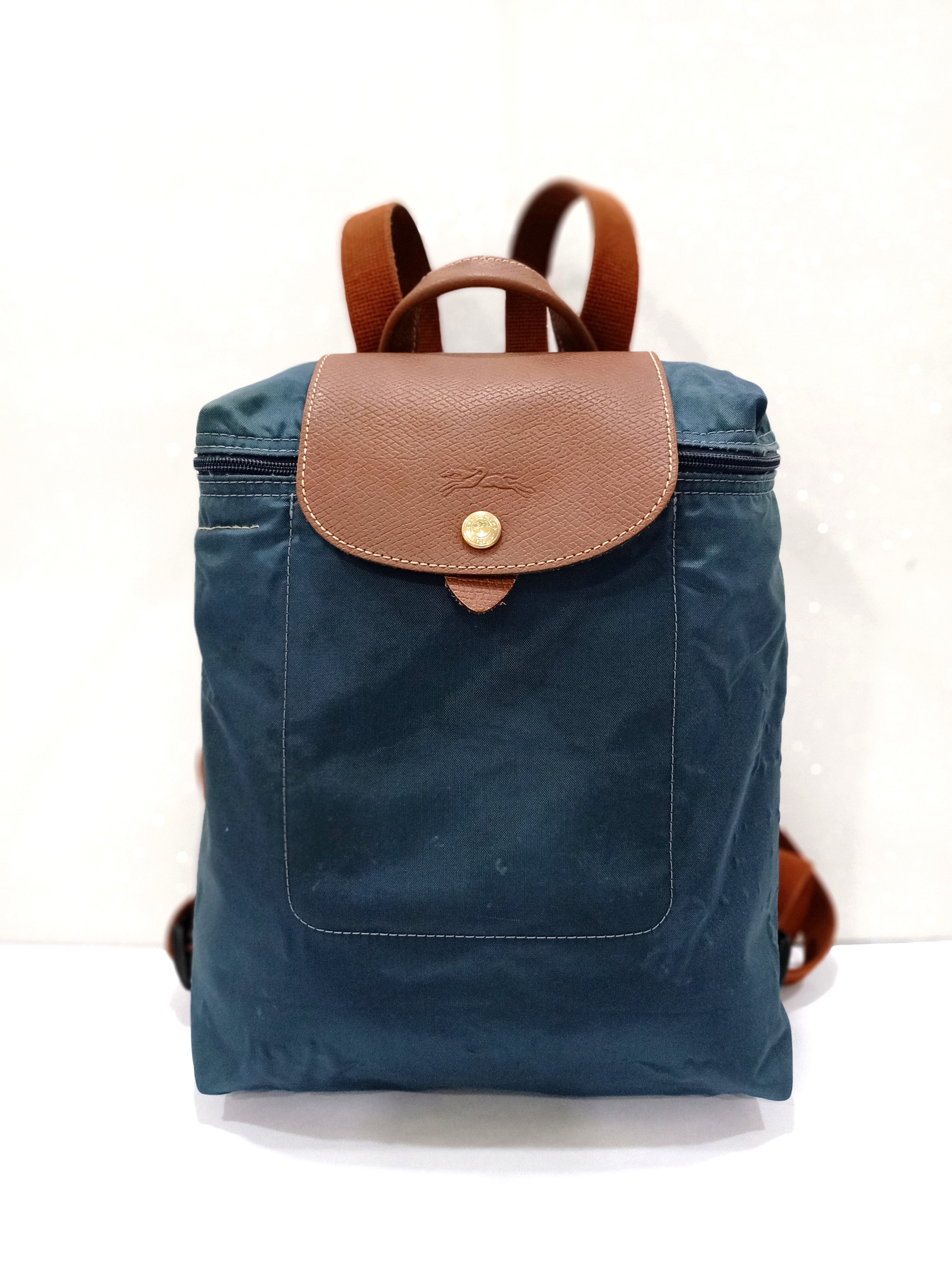 harga longchamp backpack original