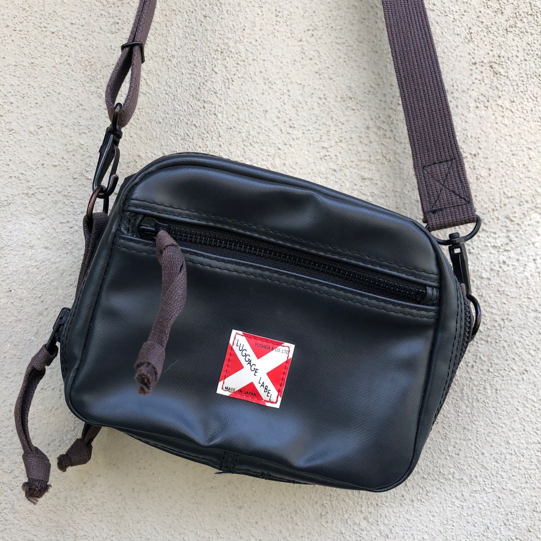 Luggage label sling bag sales