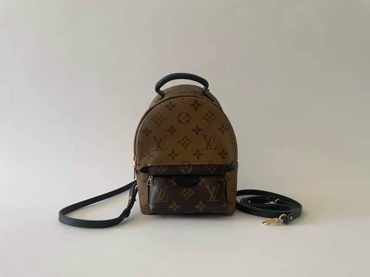 LV Palm Springs Mini Reverse (Category: Luxury Bags & Wallets) located in Manila. Submitted by bagislifeshop (Listing ID 1083919191, Image 2). Description: Most sought & hard to find New Edition, Improved zipper No datecode, Microchip RFID Monogram reverse body Black cuir leather details Shiny gold hardware Dimensions-8"x6"x3.5" Multi-way adjustable strap Comes w/ receipt, tag, dustbag Box and paperbag.