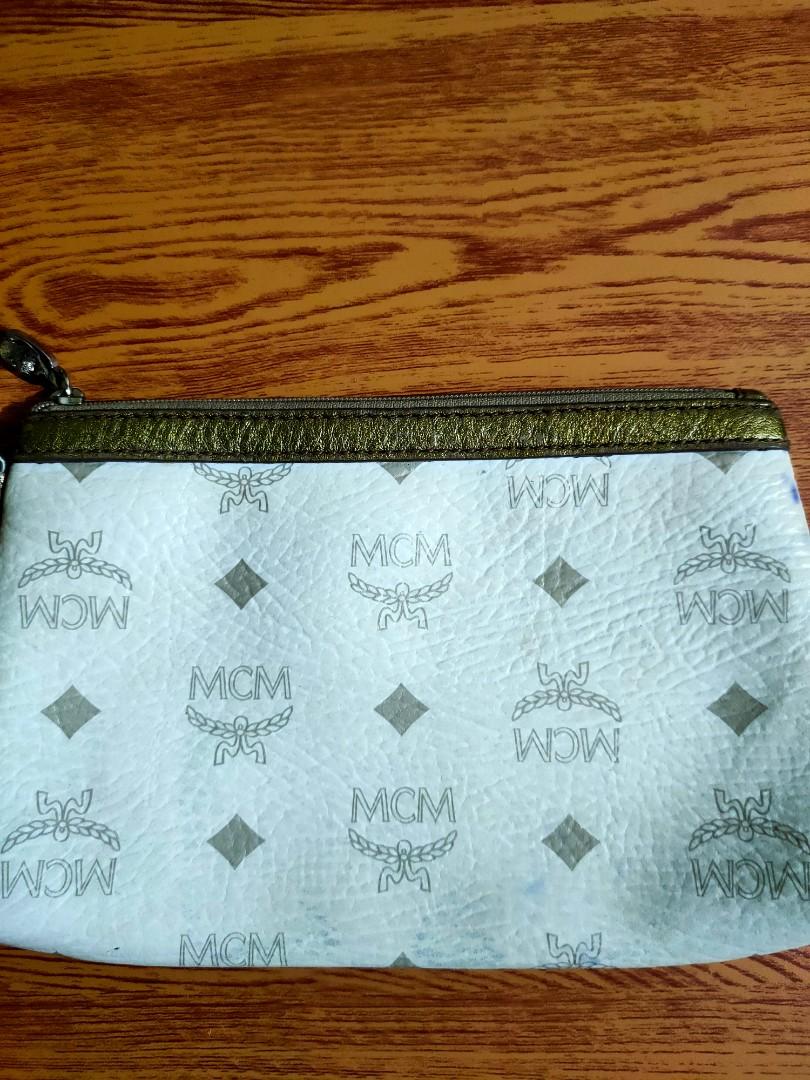 Mcm small clutch bag (Category: Luxury Bags & Wallets) located in Manila. Submitted by alilongthrift (Listing ID 1083905245, Image 2). Description: FOR SALE ONLY Price + fee Mcm small clutch bag Good condition ybs zipper 100 %LEGIT USED BUT NOT TOTALLY ABUSED DELIVERY THRU MR.SPEEDY AROUND METRO MANILA PAG SHIPPED NAMAN PO THRU J&T EXPRESS SHOULDER NIYO PO YUNG DELIVERY FEE OR SHIPPING FEE.